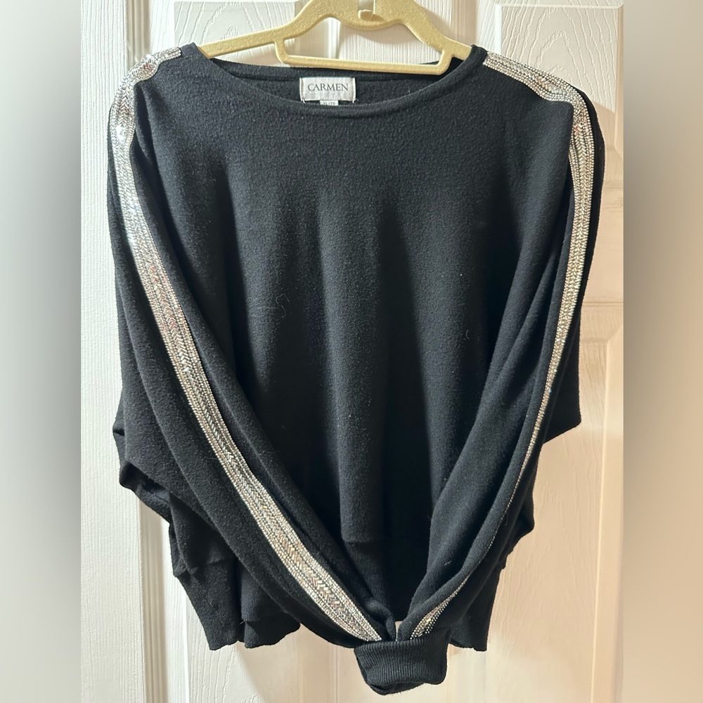 Sweater with rhinestone sleeves